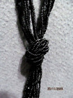 BEAUTIFUL BLACK SPARKLING  MULTI STRAND NECKLACE KNOT TO SUIT   (CLEARANCE)