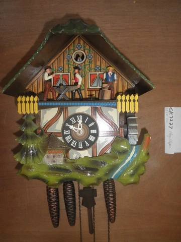 German Black Forest made Vintage  Musical Woodchopper 1 Day Cuckoo Clock CK3227 Cover