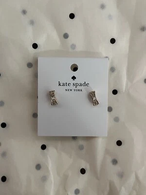 Juego de tachuelas de arco Kate Spade Ready en oro rosa/claro Foto 1 de 3