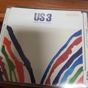 US3: Hand On The Torch  NL  > VG+ (CD) - Bild 1 von 3