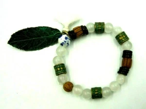 MULTI-COLOR BEADED FRIENDSHIP STRETCH BRACELET WITH LEAF & WHITE TASSEL - Picture 1 of 3