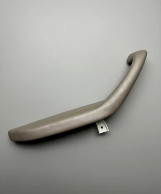 Toyota Sequoia 2001-2007 panel puerta trasera izquierda manija reposabrazos marrón Foto 1 de 4