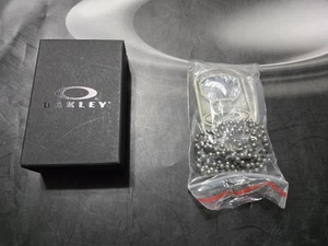 Rare Vintage Oakley 2014 Metal Dog Tag Bottle Opener GWP Silver New 101-130-001 - Picture 1 of 6