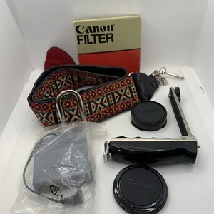 Accessoires pour appareil photo Canon années 80 vintage sangle support d'alimentation bouchon filtre alimentation - Photo 1 sur 13