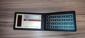 Vintage Casio MC-40S Solar Metric Converter Calculator Folding Credit Card Size - Picture 1 of 9