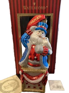 ๐ฎ๐ฒ Exceptional WATERFORD Christmas Ornament SUMMER SANTA JACK IN BOX - Picture 1 of 1