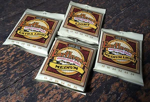 Ernie Ball Earthwood Acoustic Guitar Strings Extra Light / Light / Medium - Picture 1 of 5