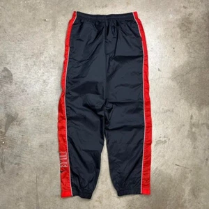 Vintage 90s Nike black windbreaker pants red stripe Youth XL (18-20) ankle zip - Picture 1 of 8