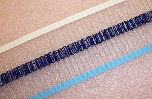 Menge (100) 100uf 6,3V AXIALE ELEKTROLYTKONDENSATOREN ECEB0JU101S PANASONIC  - Bild 1 von 3