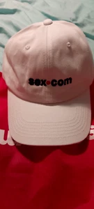 "SEX DOT COM" SET OF "2" 1  BLACK  & 1 WHITE CAP HAT - ONE SIZE FITS ALL! - NEW! - Picture 1 of 12