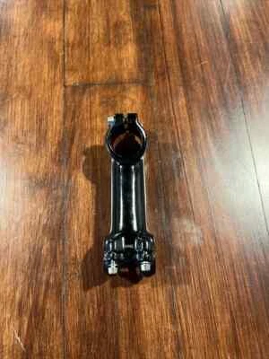 Vástago de bicicleta 100 mm +/-15 grados 1 1/8” 25,4 mm aleación negra deportiva Foto 1 de 4