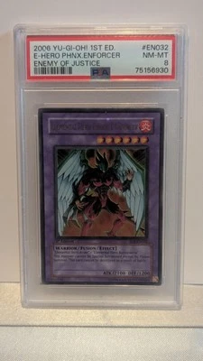 2006 YU - GI - OH! 1ST ED. E - HERO PHNX.ENFORCER ENEMY OF JUSTICE PSA 8 - Image 1 of 2