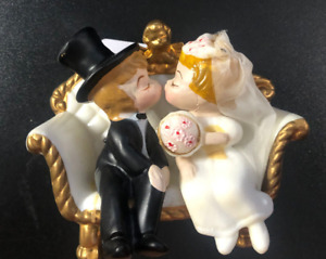 Hard plastic bride and groom on loveseat cake topper - Wilton 1970 very good
