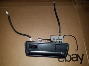 2004-2015 NISSAN ARMADA SILVER LIFTGATE HANDLE REAR HATCH W/ CAMERA 90606-7S06X - Picture 1 of 15