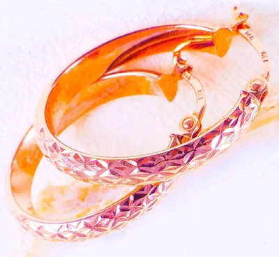 Aretes tipo argolla ovalados texturizados talla diamante oro rosa 14K 1,84 gramos Foto 1 de 4