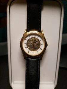 Guess Damenuhr Gold, Weiß, Schwarz Leder  - Bild 1 von 12