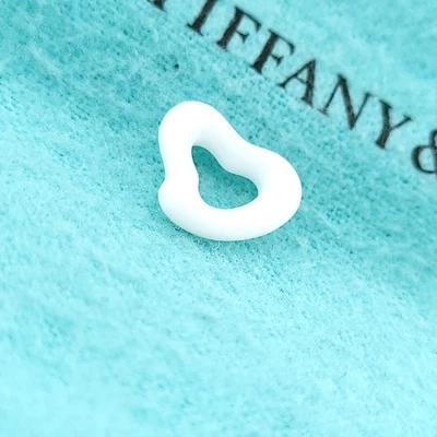 Tiffany & Co. Elsa Peretti Carved White Chalcedony Carved Open Heart Pendant - Image 1 of 4