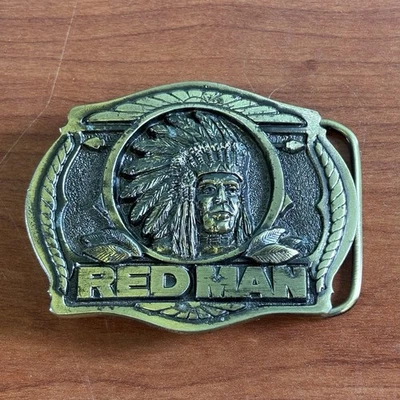 Hebilla de cinturón de latón vintage Red Man Chewing Tobacco Chief 1988 Pinkerton Tobacco Chief Foto 1 de 4