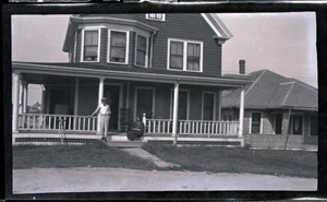 LATE 1800s/EARLY 1900s FILM NEGATIVE, MAINE COAST; MAN & WOMAN ON COTTAGE PORCH - Picture 1 of 1