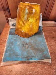 NOS 1981-1985 Ford Escort MERC LYNX LH Front Parking Lamp # E1FZ-13201-A - Picture 1 of 5