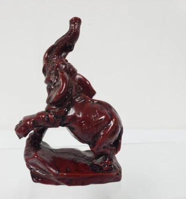 Elephant with Trunk Up Dark Red Resin Figurine 3.5 Inches Tall - Image 1 of 4