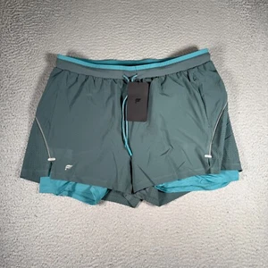 Short Fabletics homme XL cyan 3" kadence court doublé gym poches intérieures neuf avec étiquette - Photo 1/7