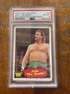 O-Pee-Chee Jake The Snake Roberts 1985 #33 PSA 8 casi nuevo-mt opc radiocontrol bajo pop ser. 2 - Imagen 1 de 2
