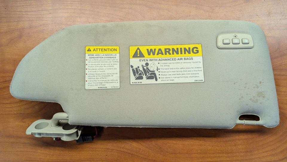 Parasol izquierdo Volvo XC90 2007-2014 con abridor de puerta de garaje Homelink beige Foto 1 de 4