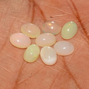 Piedras preciosas sueltas sin calentar cabujón ovalado etíope multi brillo natural de 4 quilates/8 piezas - Imagen 1 de 6