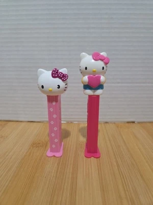 “HELLO KITTY” Set Of 2 PEZ Candy Dispenser Pink Stems - Image 1 of 4