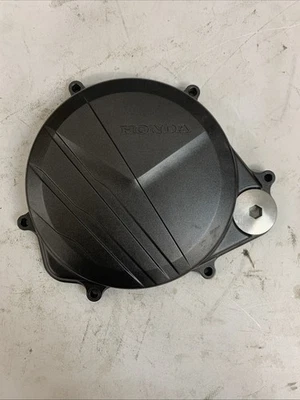 Cubierta de embrague 17-20 CRF450R CRF450RX OEM 11351-MKE-A00 Honda nunca usada despegue Foto 1 de 4