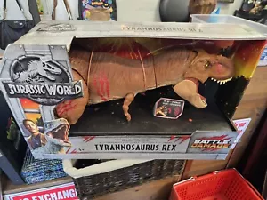 Jurassic World Battle Damage Tyrannosaurus Rex Figur Roarin' Super - Bild 1 von 1