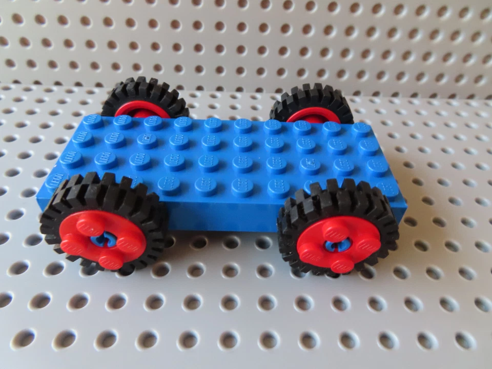 Lego Fahrgestell blau 30076 Stein 4x10 + 4 Reifen Felge rot 6248c01 4169 9253 - Bild 1 von 1