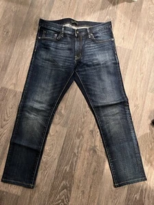 Pantalones de mezclilla ajustados con ribete elástico UNIQLO para hombre - talla 31x32 *DOBLADILLO* - Imagen 1 de 6