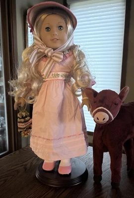American Girl Caroline Doll, Meet Outfit + Straw Hat & Purse, Garnet Calf & Book - Image 1 of 4