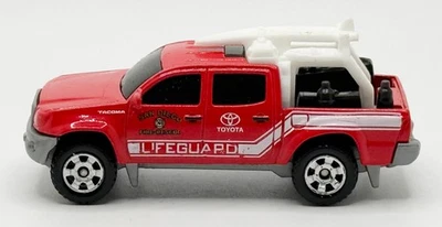 Matchbox Toyota Tacoma Life Guard Die-Cast 2013 rojo Tailandia Foto 1 de 4
