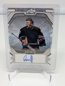 Olaf Kolzig 2025 Foglia Metallo Hockey Leggende Argento Shimmer Acetato #'d 3/5 AUTO - Foto 1 di 2