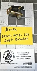 HONDA VF500C 61304-MJ8-671 LEFT HEADLIGHT STAY USED 1 QUANTITY OEM FREE SHIPPING - Picture 1 of 2