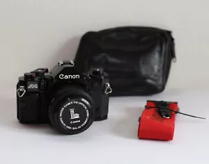 Canon A-1 / A1 - Cuerpo de cámara SLR en negro incl. objetivo 50 mm 1:1.8 - Imagen 1 de 6