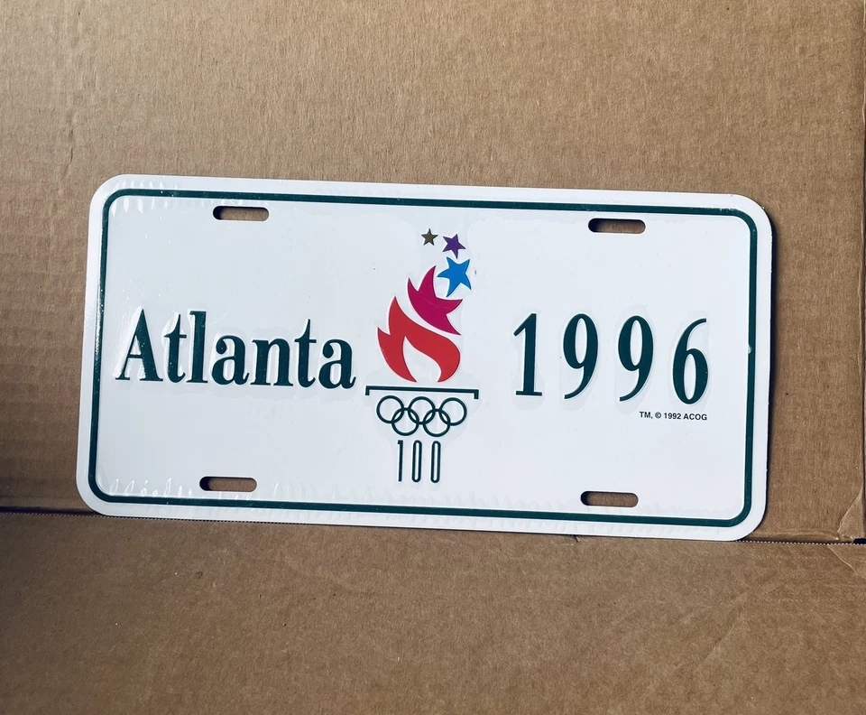 Placa conmemorativa de los Juegos Olímpicos de Atlanta 1996 de metal blanco Foto 1 de 3