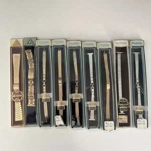 Konvolut 9 Vintage Uhrenarmbänder noch in original Kunststoffboxen Gold Silber - Bild 1 von 9