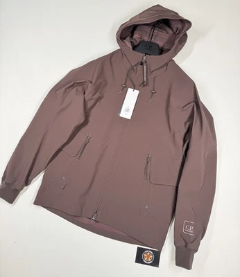 CP COMPANY 004A METROPOLIS SERIES METROSHELL HOODED JACKET IN RUM & RAISE-XXXL - Image 1 of 4
