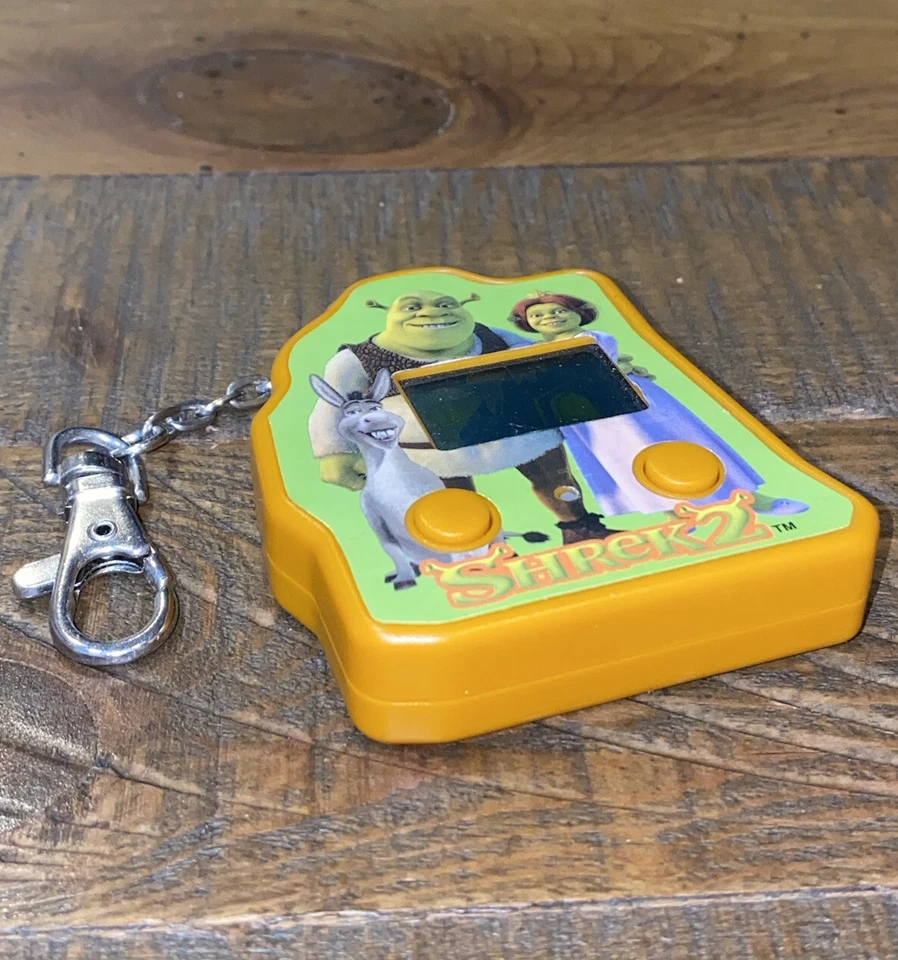SHREK 2 2004 Llavero Electrónico Portátil LCD Videojuego Techno Fuente Foto 1 de 4