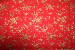 METALLIC GOLD FLOWERS AND BOWS ON RED BY JOAN KESSLER - 100% COTTON FABRIC - Picture 1 of 4