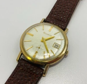Orologio Bulova carica manuale 11ALD data 10k RGP lunetta oro 32mm funzionante - Foto 1 di 8