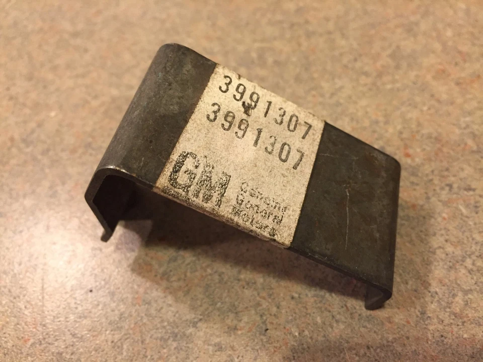 1971 1972 CHEVROLET VEGA NOS GM JACK RETAINER HOLD DOWN 3991307 - Image 1 of 1