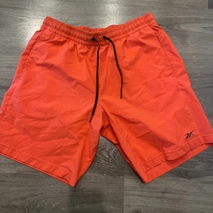 Pantalones Cortos Tejidos de Entrenamiento REEBOK Para Hombre Talla Grande L Naranja - Imagen 1 de 7