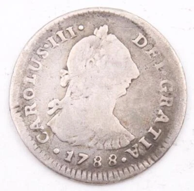 1788 IJ Peru 1 real silver coin VG/F bent - Image 1 of 2