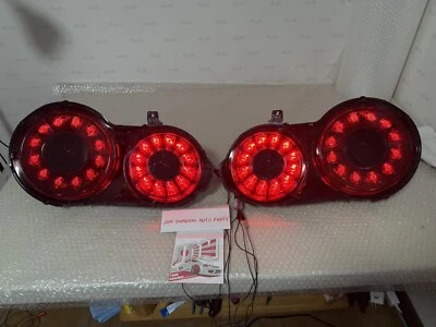 Juego de luces traseras originales Nissan R35 GT-R GTR PINTURA BLACKOUT OEM NISMO Foto 1 de 4