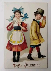 Vintage Valentine postcard girl bow boy tipping his hat - Picture 1 of 7